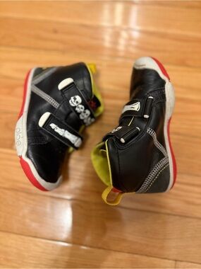 PLAE Kids Black Sneakers with Red and Yellow Accents